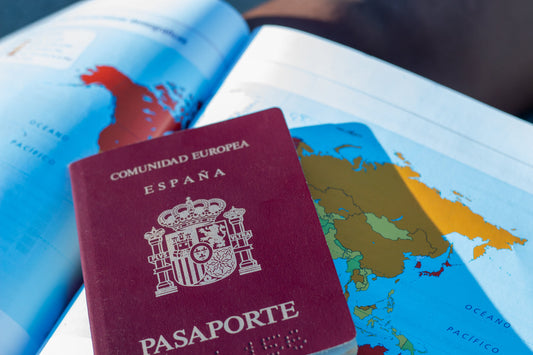 Spanish passport on a globe map