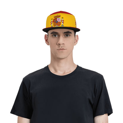 Person wearing a yellow cap with a red and blue emblem on a white background