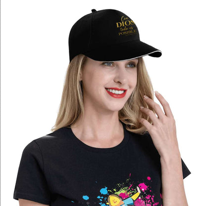 Woman wearing a black cap with text and a black t-shirt with colorful design on a white background